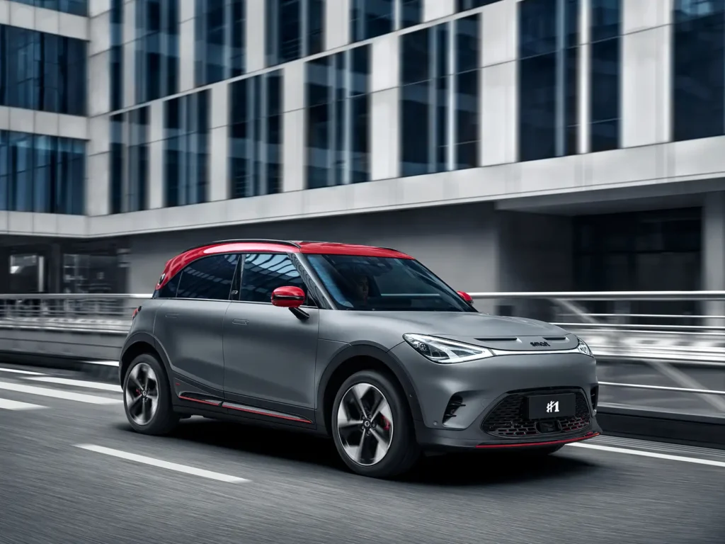 Grey smart #1 BRABUS electric car with a red roof driving down a city street