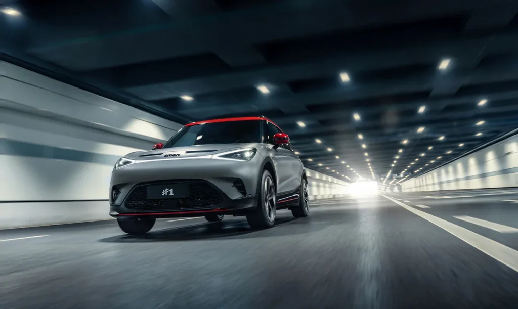 Grey smart #1 BRABUS electric car driving through a city tunnel