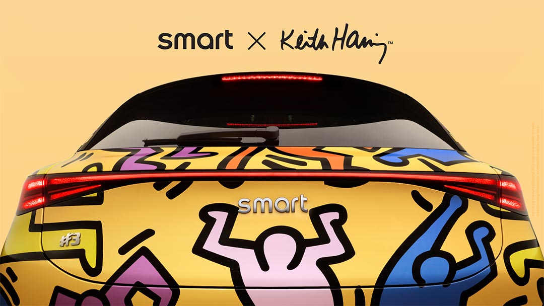 View of the back of the smart #3 Keith Haring Art Car in a studio