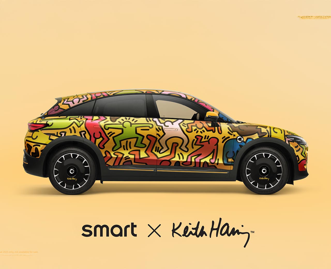 Side view of the smart #3 Keith Haring Art Car on a pale orange background