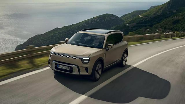 Front three quarter view of a sand coloured smart #5 electric SUV